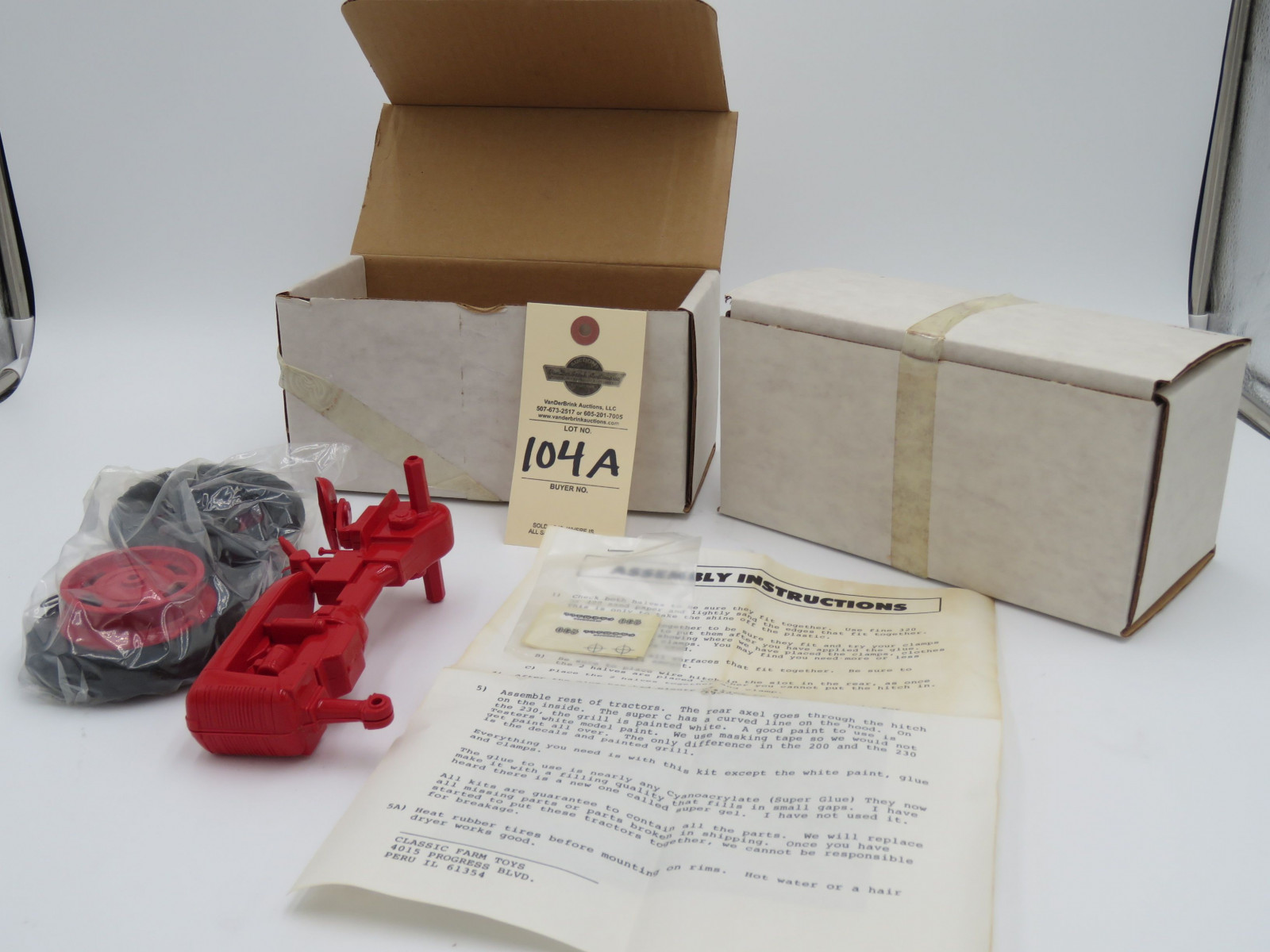 2 OPENED BOXES CASE IH PUT TOGETHER PLASTIC TRACTORS 200 230 - Image 1