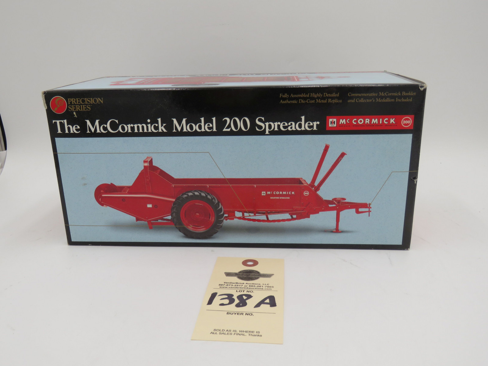 1997 ERTL PRECISION SERIES THE MCORMICK MODEL 200 SPREADER 1/16 SCALE DIE-CAST METAL NIB - Image 1