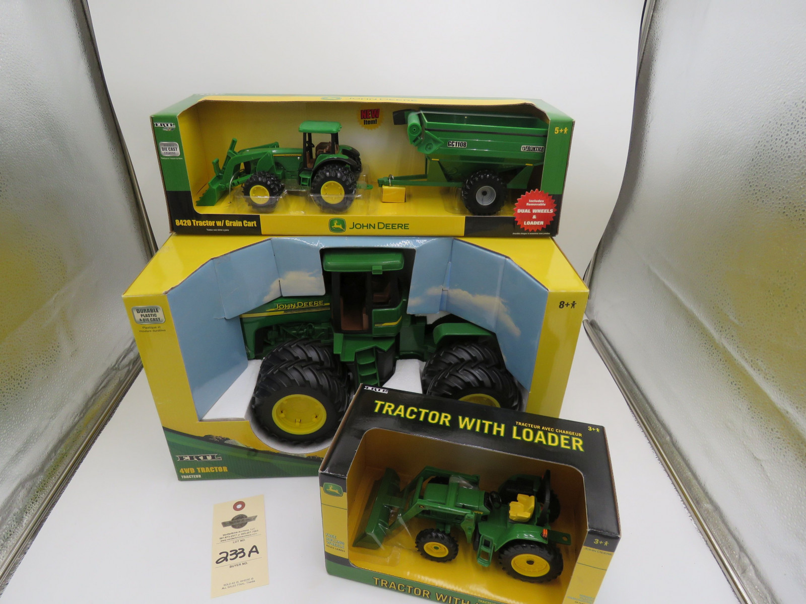2002 Ertl for John Deere Tractor with loader plastic die cast NIB and 2006 Ertl for John deere 4WD tractor plastic die cast NIB and 2004 ERTL for John Deere 8420 Tractor with grain cart plastic die cast NIB Selling as a group 1/16 scale - Image 2