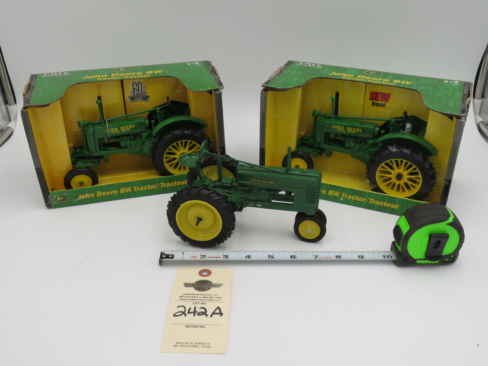 2005 Ertl John Deere BW Tractor 1/16 Scale NIB Metal Die-Cast and 2002 John Deere BW Ertl Metal Die-Cast 1/16 Scale NIB and John Deere Metal Die-Cast with no box 200 carved on bottom. Selling as a group of 3 - Image 1