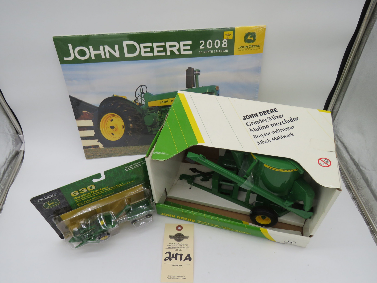 1998 Ertl John Deere Grinder/Mixer 1/16 Scale NIB #5002 and 2002 Ertl John Deere 630 Tractor Metal Die cast 1/64 Scale NIB and 2008 John Deere 16 month calender never been opened. Sold as a group of 3. - Image 2