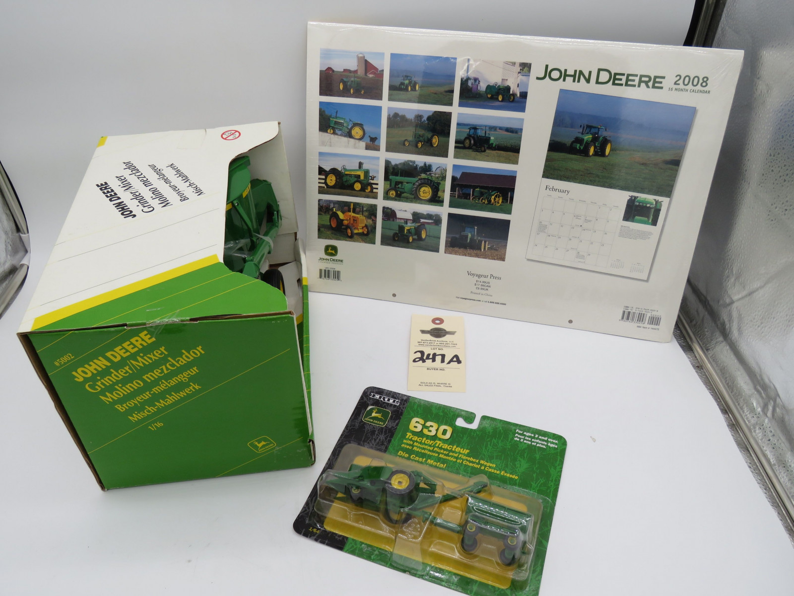 1998 Ertl John Deere Grinder/Mixer 1/16 Scale NIB #5002 and 2002 Ertl John Deere 630 Tractor Metal Die cast 1/64 Scale NIB and 2008 John Deere 16 month calender never been opened. Sold as a group of 3. - Image 4