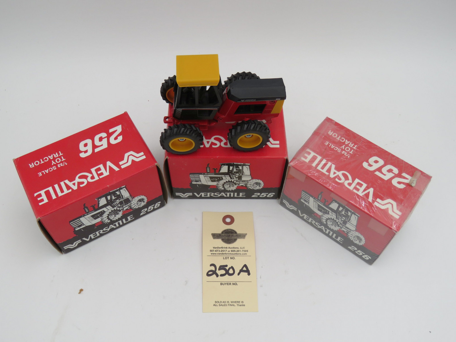 Versatile 256 1/32 scale Toy Tractor Ertl D, Iowa NIB and Versatile 256 1/32 Toy Tractor box still sealed Versatile 256 1/32 Scale Toy Tractor NIB. Sold as a group of 3. - Image 2
