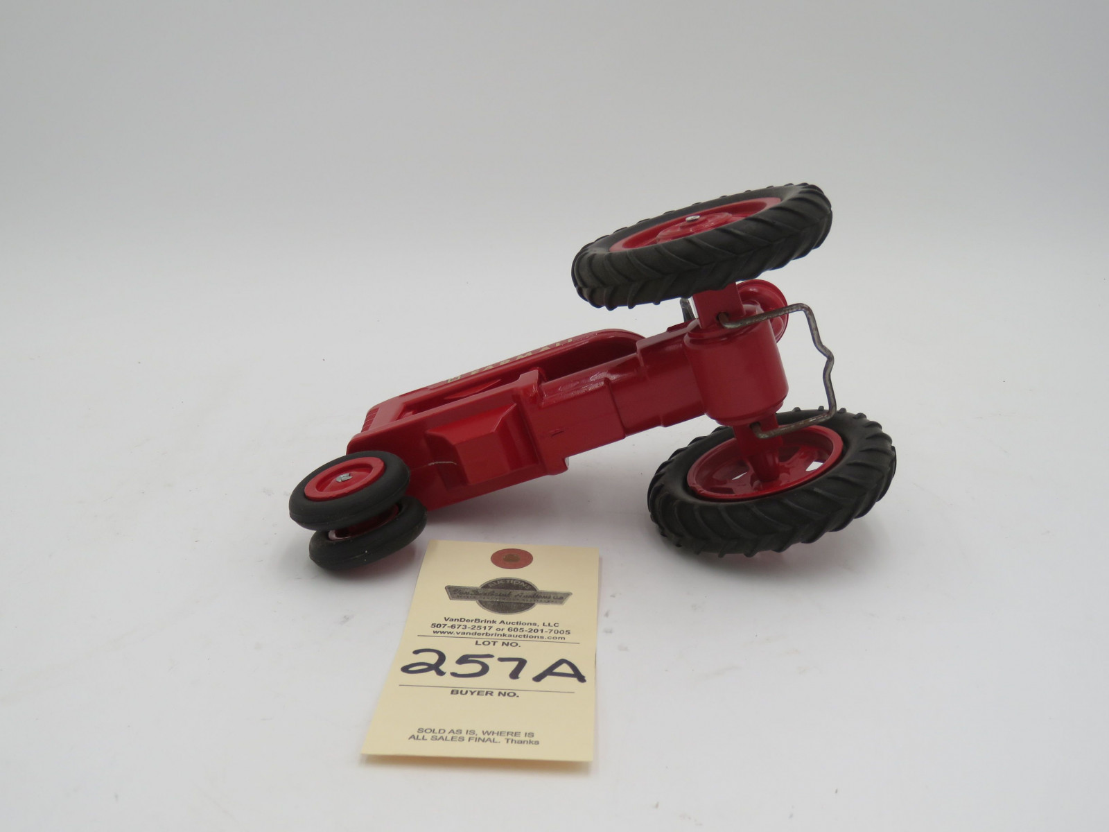 IH Farmall plastic die-cast tractor. Steering wheel broke. No box. - Image 5