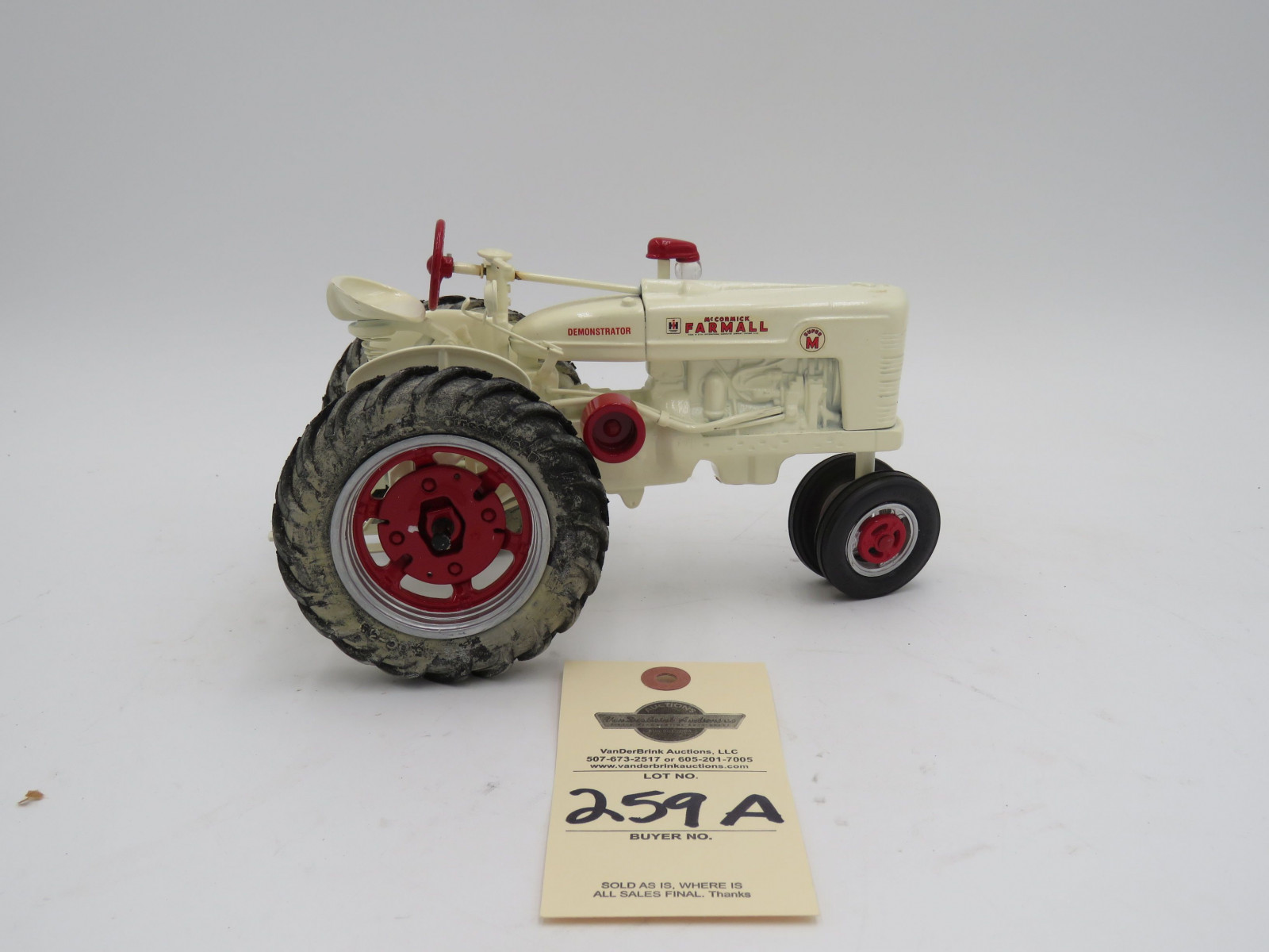 Farmall Super M Demonstrator Metal Die-Cast tractor. Model by Freiheit. Firestone rear wheels, and Good Year front tires. - Image 1