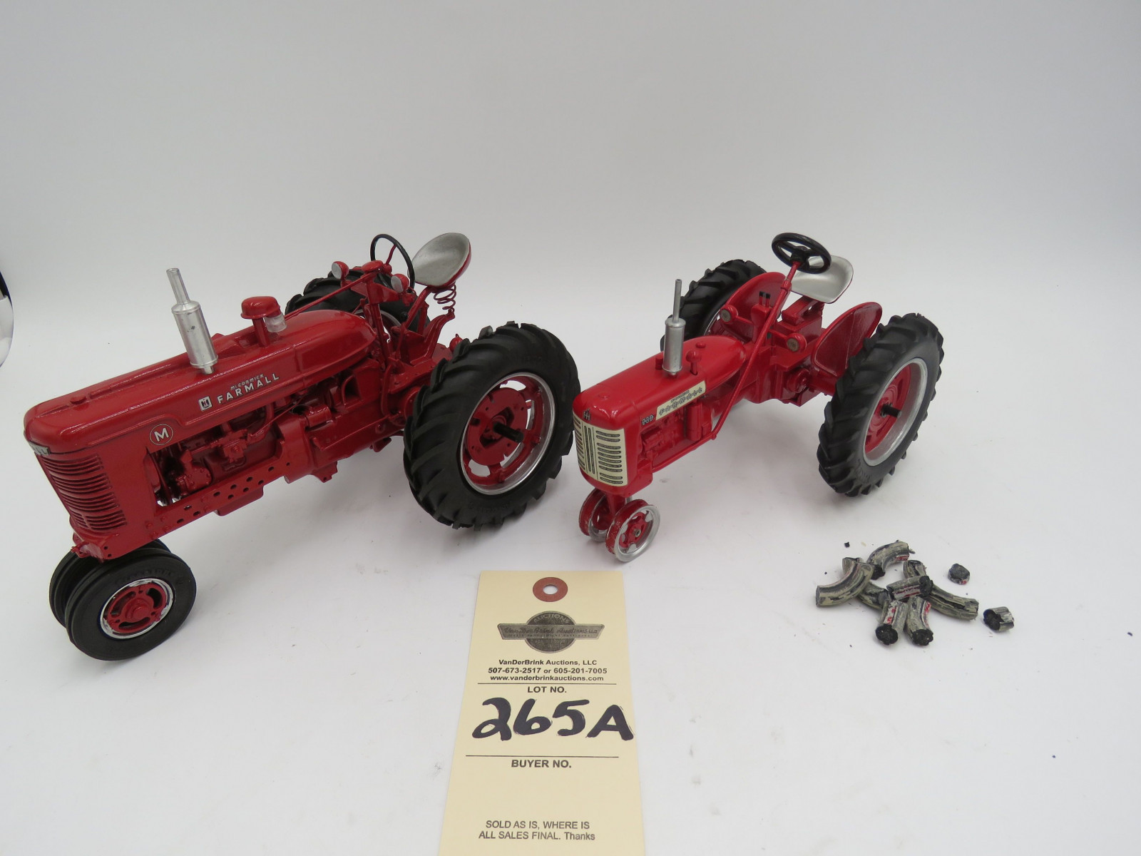 McCormick Farmall 230 metal diecast tractor. Missing front tires.1993 Mcormick Farmall M IH Metal Die cast tractor with Firestone tires. No boxes. Sold as a set of 2 1/16th Scale - Image 2