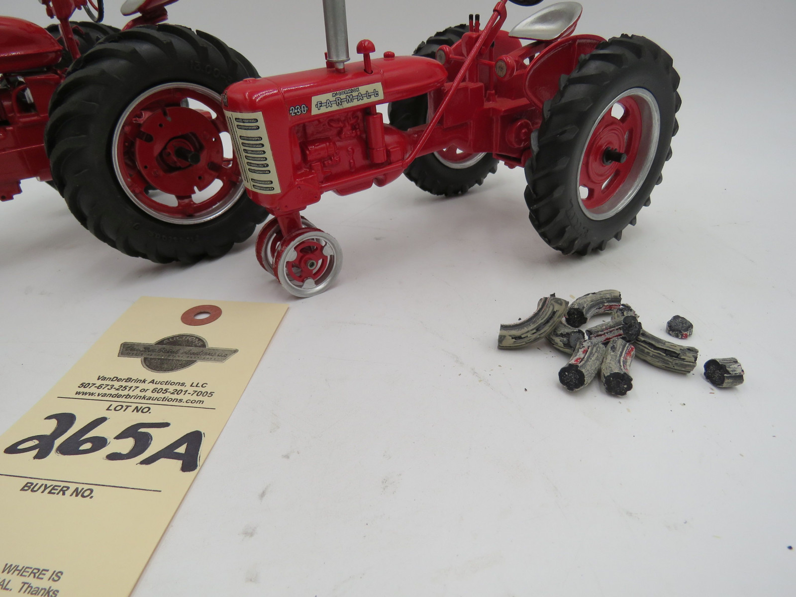 McCormick Farmall 230 metal diecast tractor. Missing front tires.1993 Mcormick Farmall M IH Metal Die cast tractor with Firestone tires. No boxes. Sold as a set of 2 1/16th Scale - Image 4
