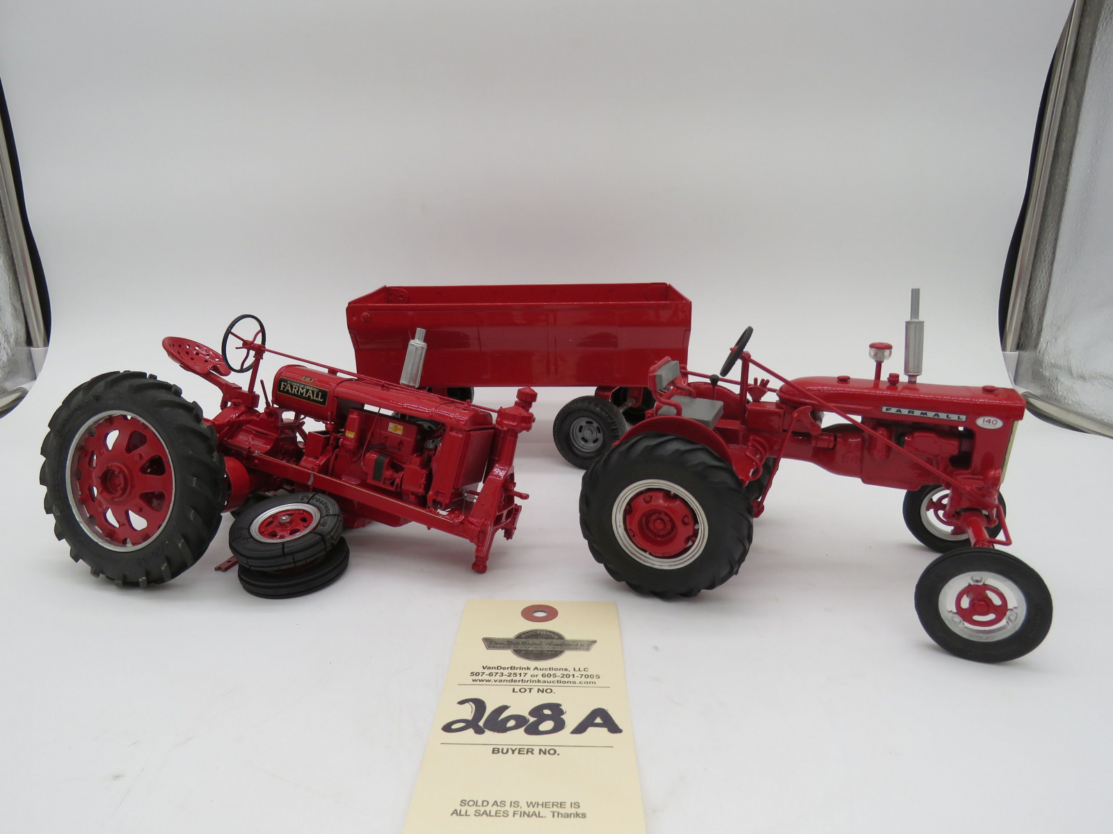 Metal Ertl red wagon metal die-cast. Farmall 140 metal diecast tractor. Broke Farmall F-20  tractor in a horrible accident. Sold as a lot of 3. - Image 1