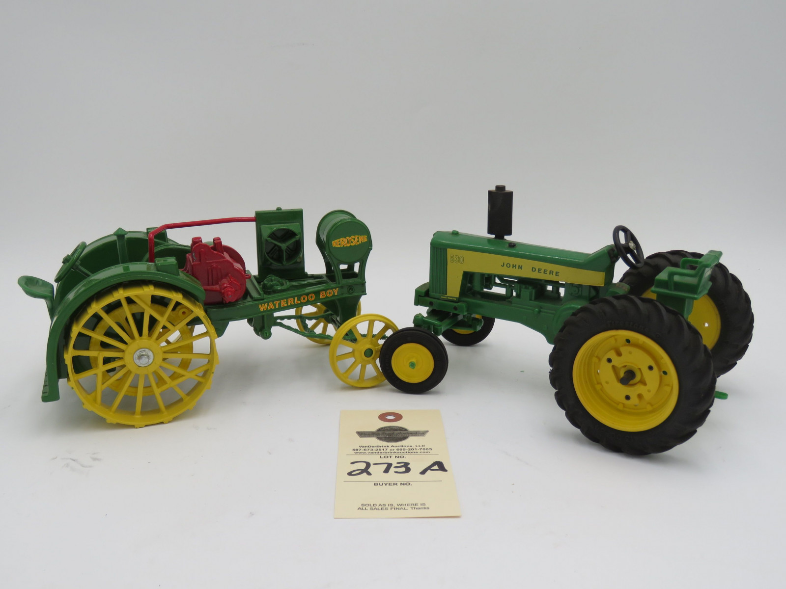John Deere 530 plastic tractor 1987 Plow City. ErtlD, Iowa Waterloo Boy Kerosene metal die-cast tractor. Sold as a set of 2. - Image 1