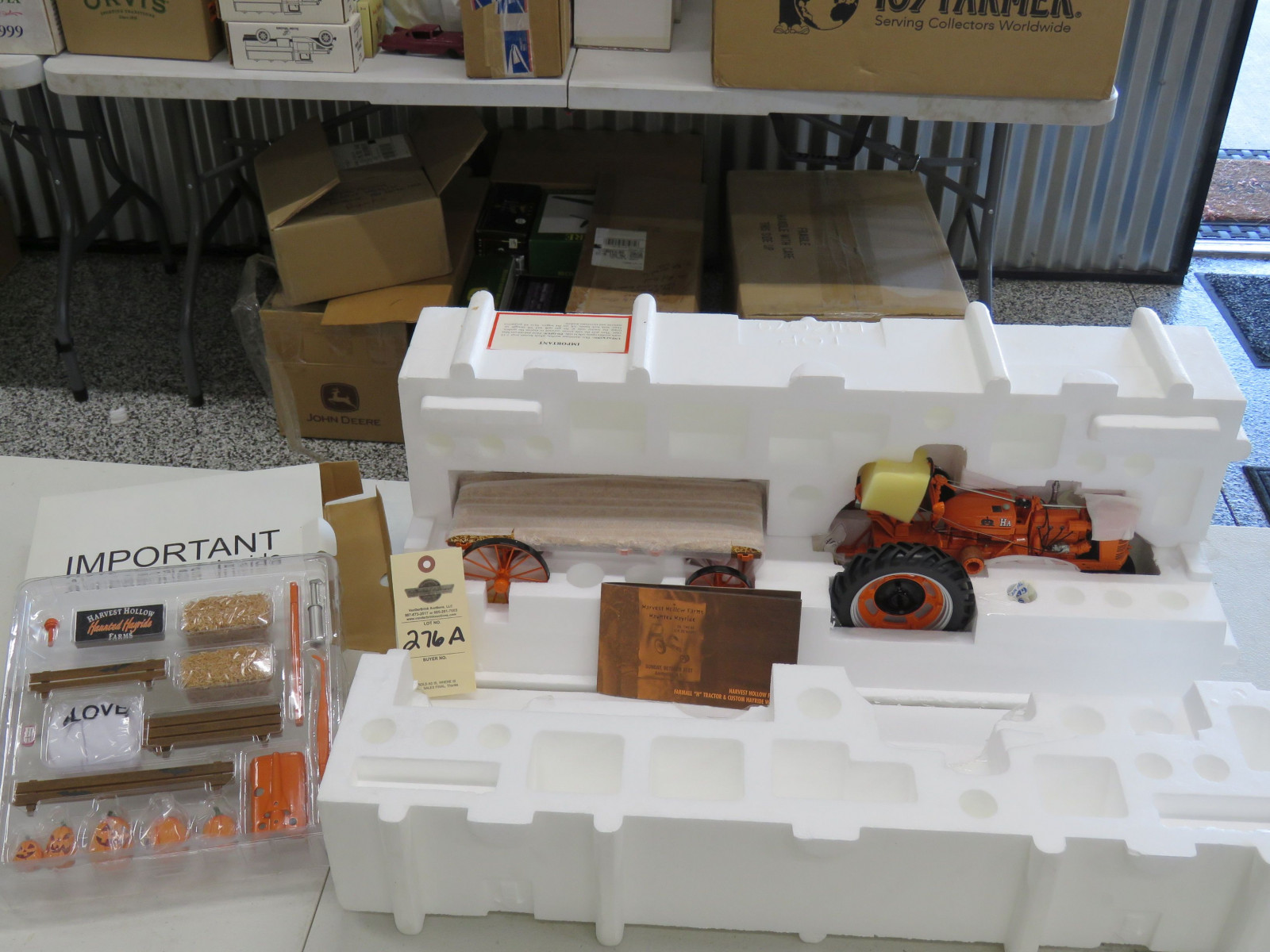 One of a kind Farmall H Halloween Tractor and custom hayride wagon. Not taken out of styrofoam. Includes accessories new in box. Harvent Hollow Farms Haunted Hayride booklet included. Certificate of Autheticity. - Image 1