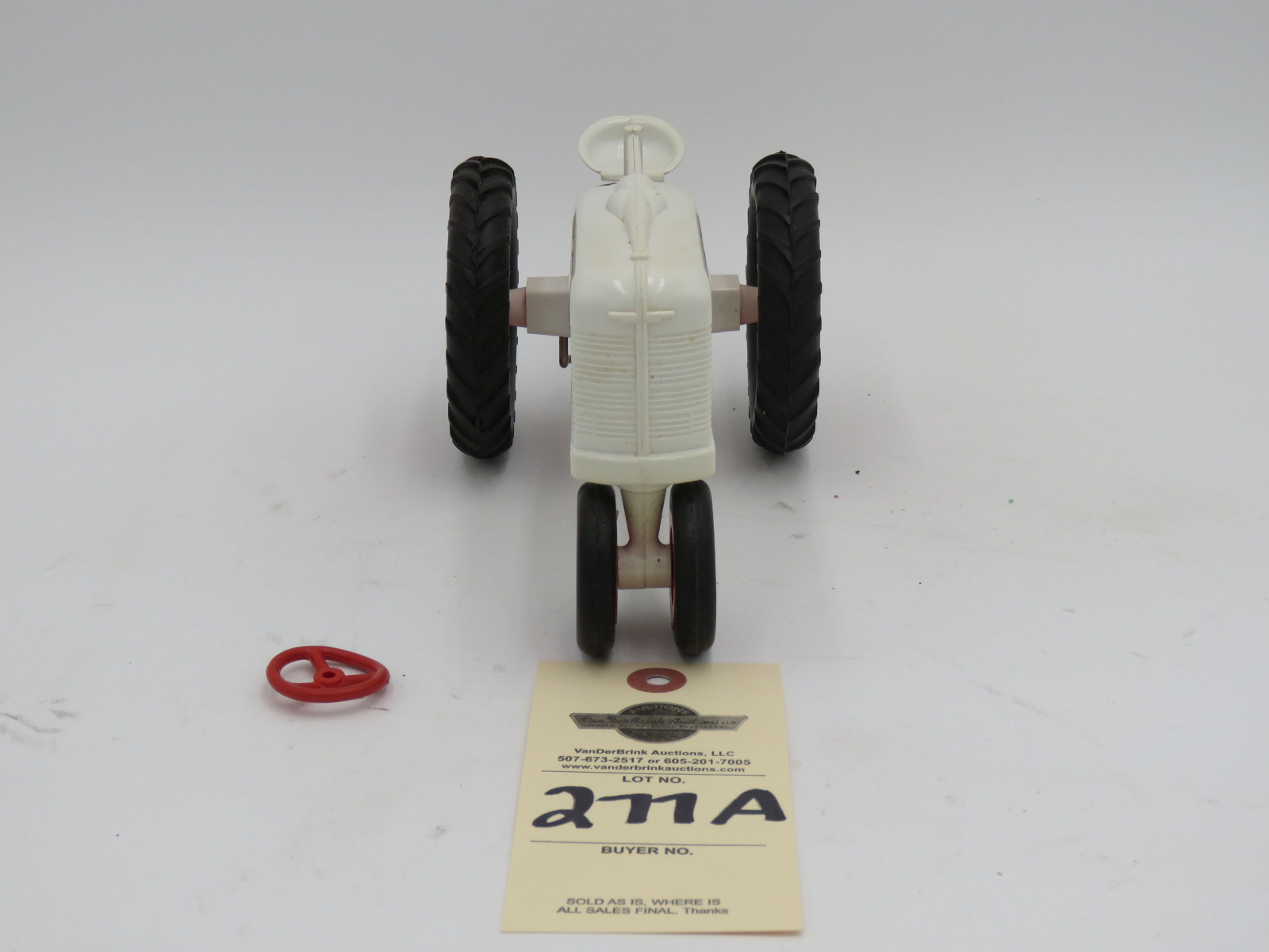 McCormick Farmall white plastic die-cast tractor. Opened box. Steering wheel  broke but provided in box. - Image 5