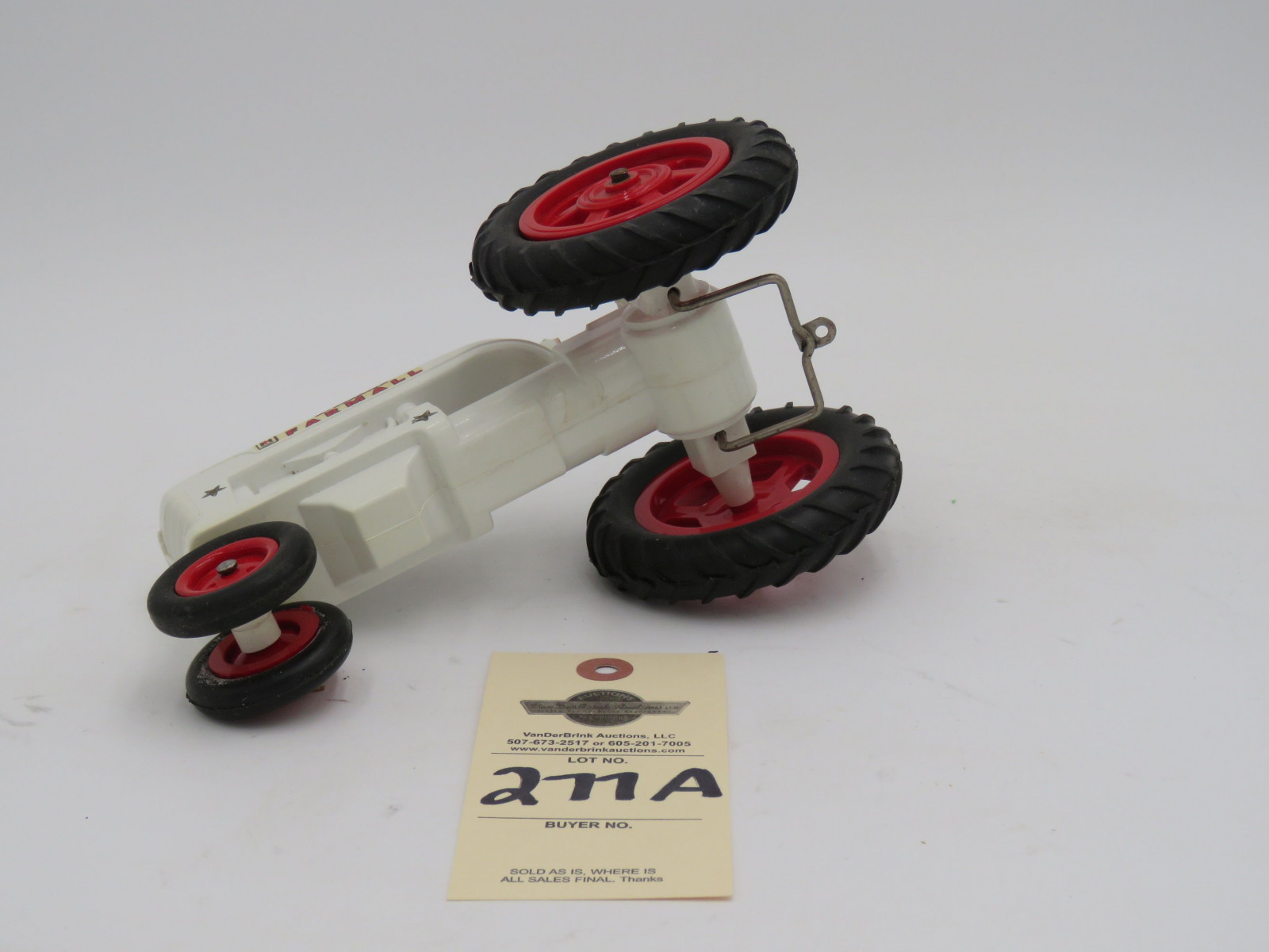 McCormick Farmall white plastic die-cast tractor. Opened box. Steering wheel  broke but provided in box. - Image 6
