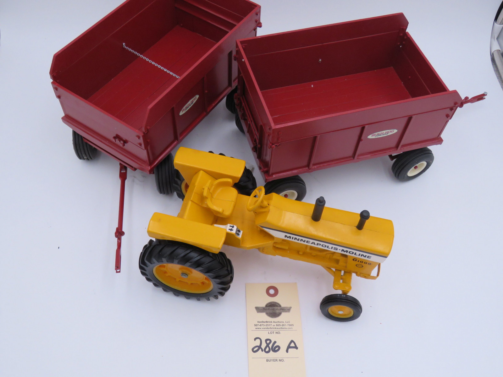 Minneapolis Moline G1000 Ertl metal die-cast tractor no box. 2 Bush Hog Stan Horst metal die cast wagons. No box. Sold as a set of 3. 1/16th Scale - Image 4