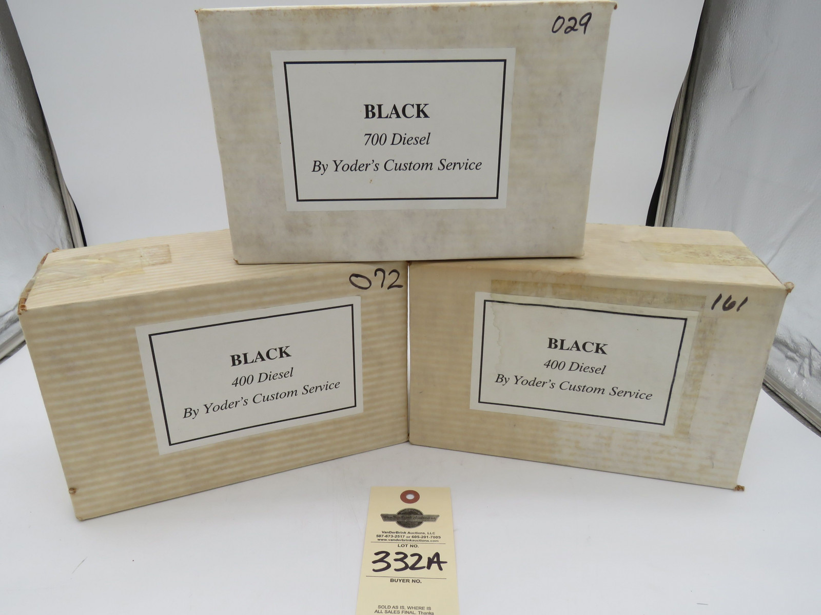 Group of Yoder Tractors including 2- Yoder Black 400 Diesel NIB, and 1 Yoder Black 700 Diesel NIB - Image 1