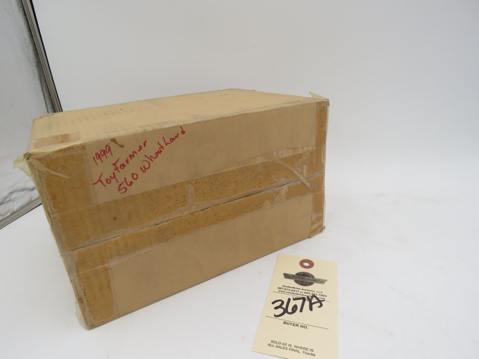 1999 Toy Farmer by Ertl NIB and Shipping packaging 560 Wheatland DieCast Tractor by Ertl - Image 1