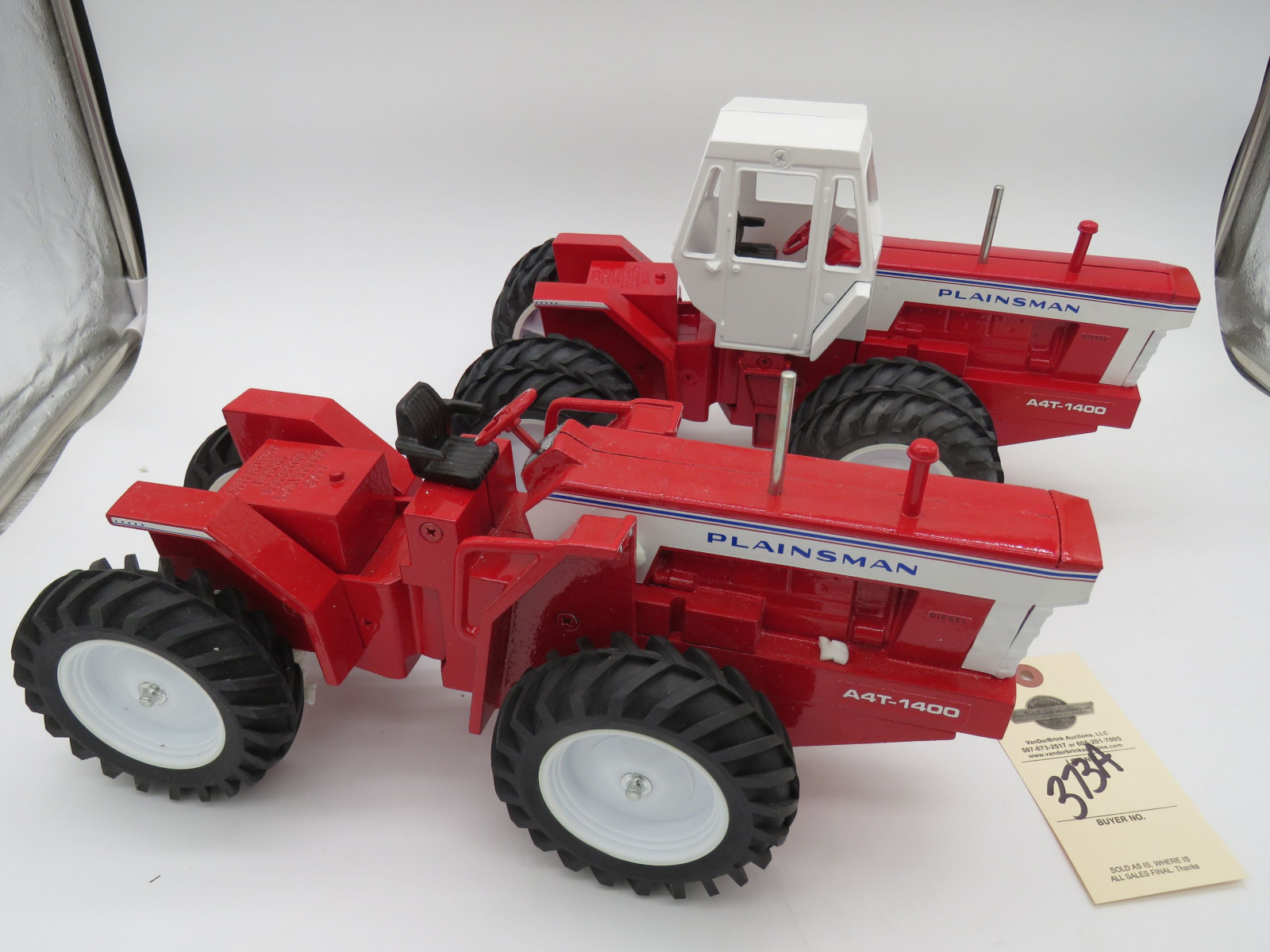 Pair of Scale Models by Ertl New 1/16th Scale Die-Cast Plainsman A4T-1400 4WD with Cab and Joseph Ertl Autograph and also Plainsman A4T-1400 without Cab New and No Boxes - Image 1