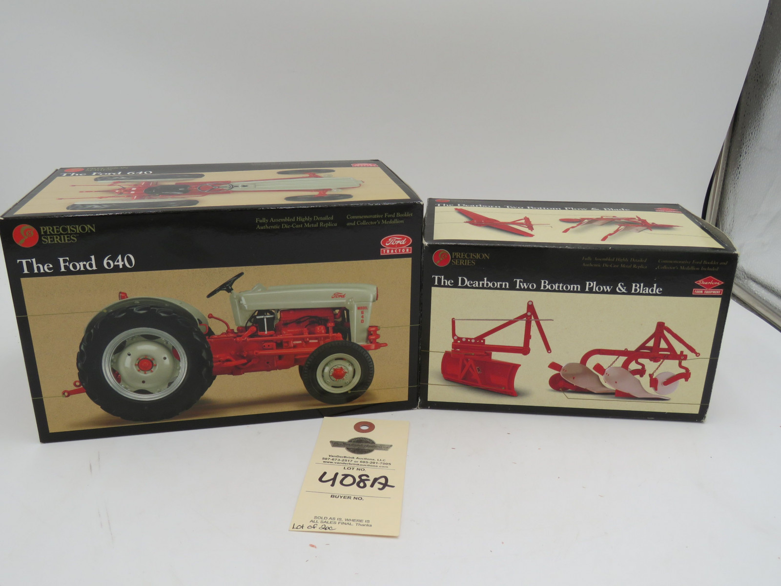 Sellling as  a Pair 2002 Ertl Precision Series the Ford 640 1/16th Scale Die-Cast Tractor NIB and 1996 Ertl Precision Series the Dearborn Two Botoom Plow and Blade NIB - Image 1