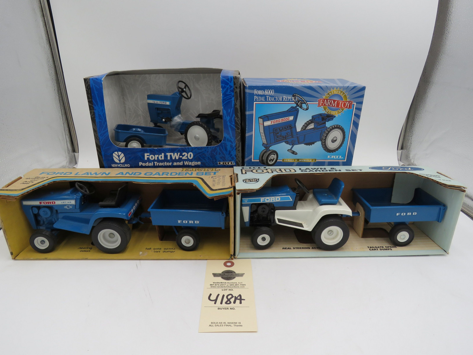 Grouping of Ford Motor Company Licensed Die Cast Pedal and Lawn And Garden Tractors NIB - Image 1