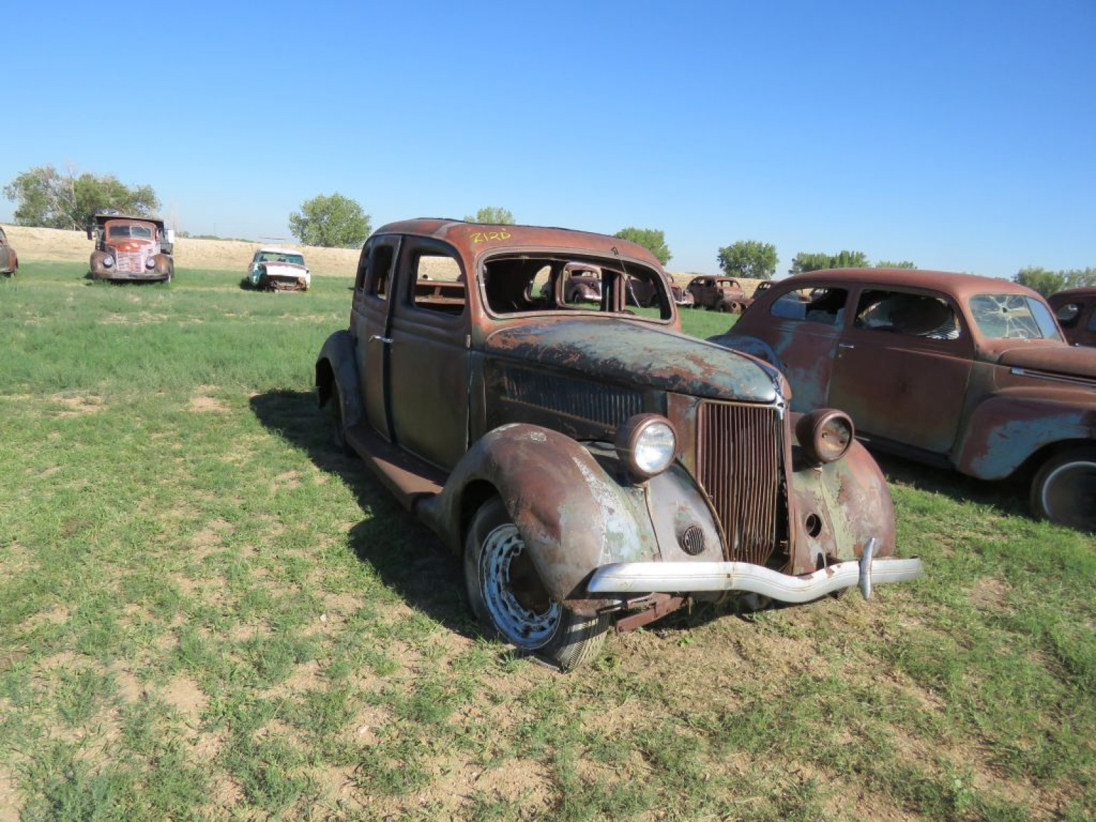 1937 Ford 4dr Suicide Sedan - Image 1