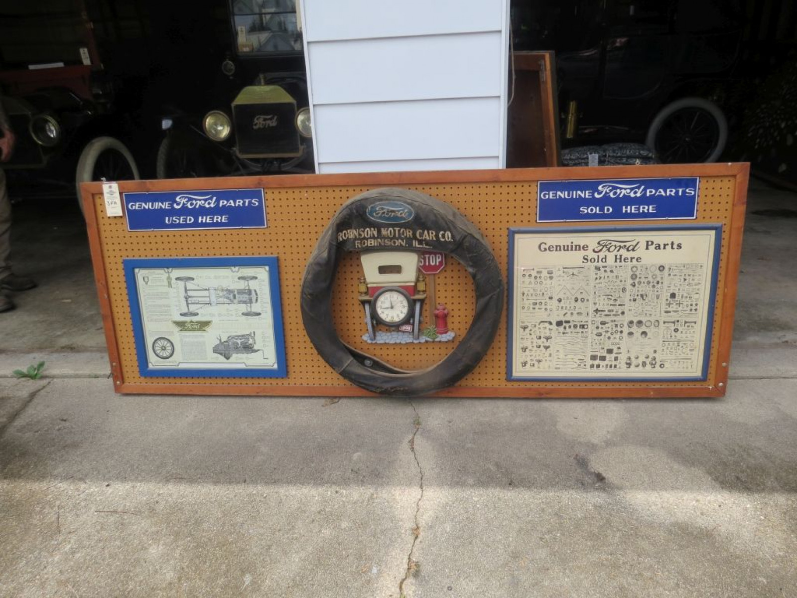 Board of Reproduction Signs and Tire Cover - Image 1