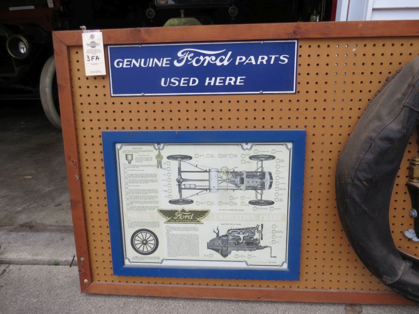 Board of Reproduction Signs and Tire Cover - Image 2