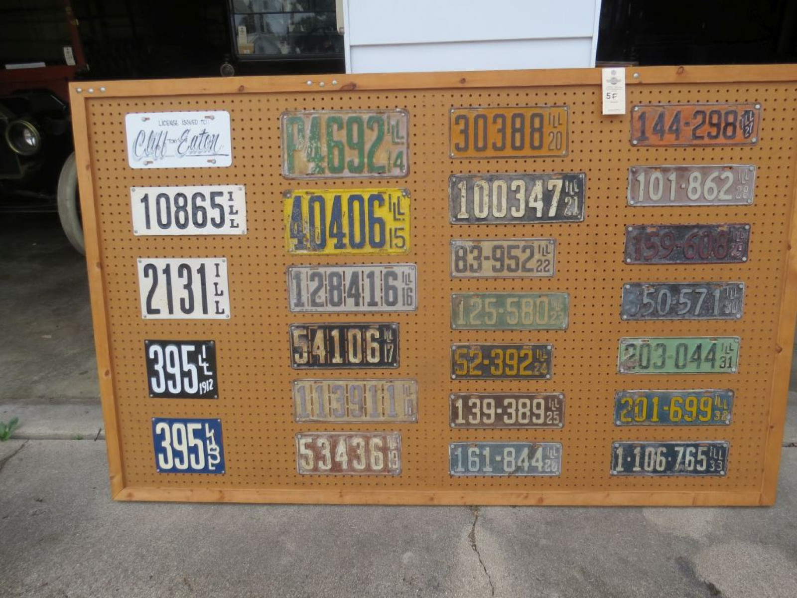 Board of Early Illinois License Plates from 1910-1933 - Image 1
