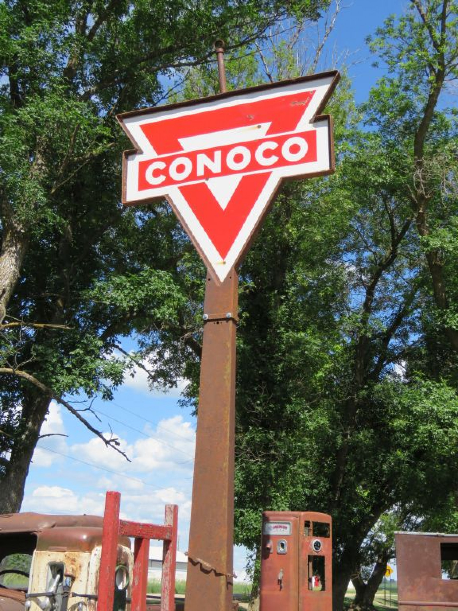 Conoco Porcelain sign on pole with Frame - Image 1